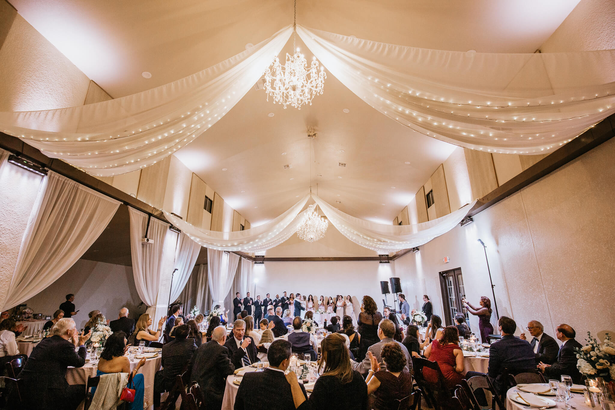 reception venue filled with guests