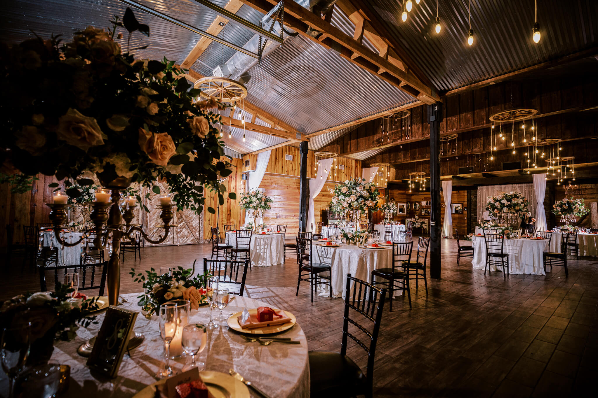 Elegant reception space for a wedding in a barn at an outdoor wedding venue in Central FL
