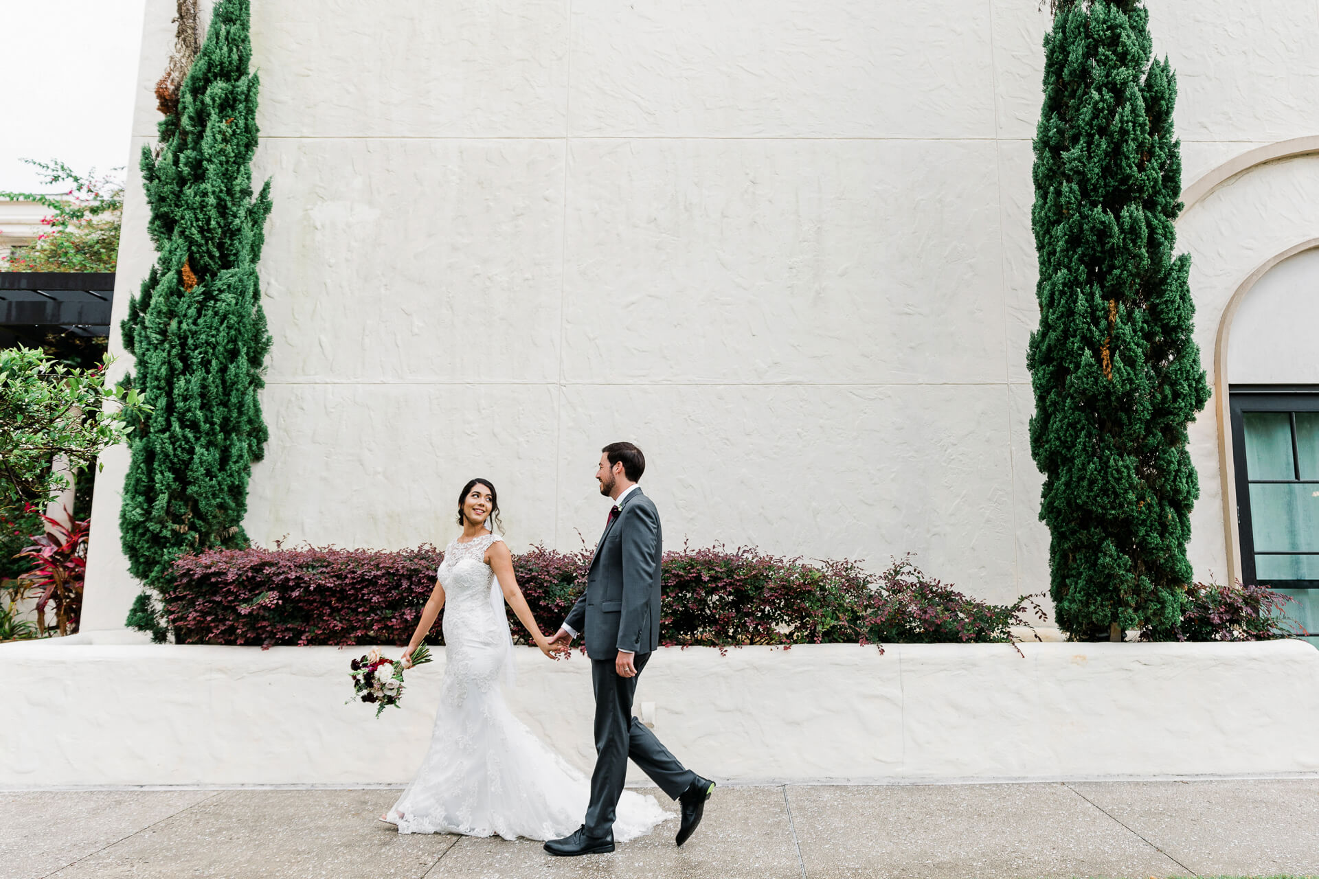 wedding couple walking through an elopement venue in Orlando