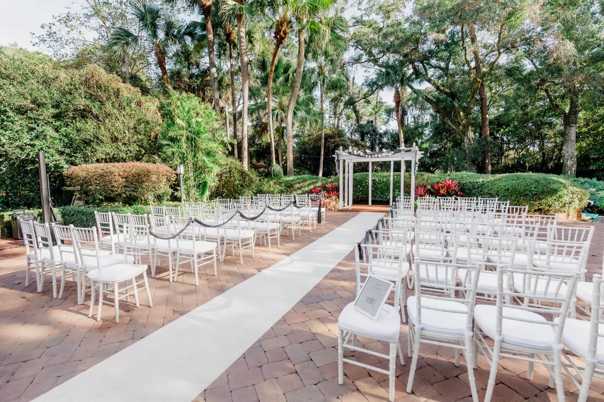 ceremony site with a brick flooring at The Garden Villa, a popular elopement venue in Orlando