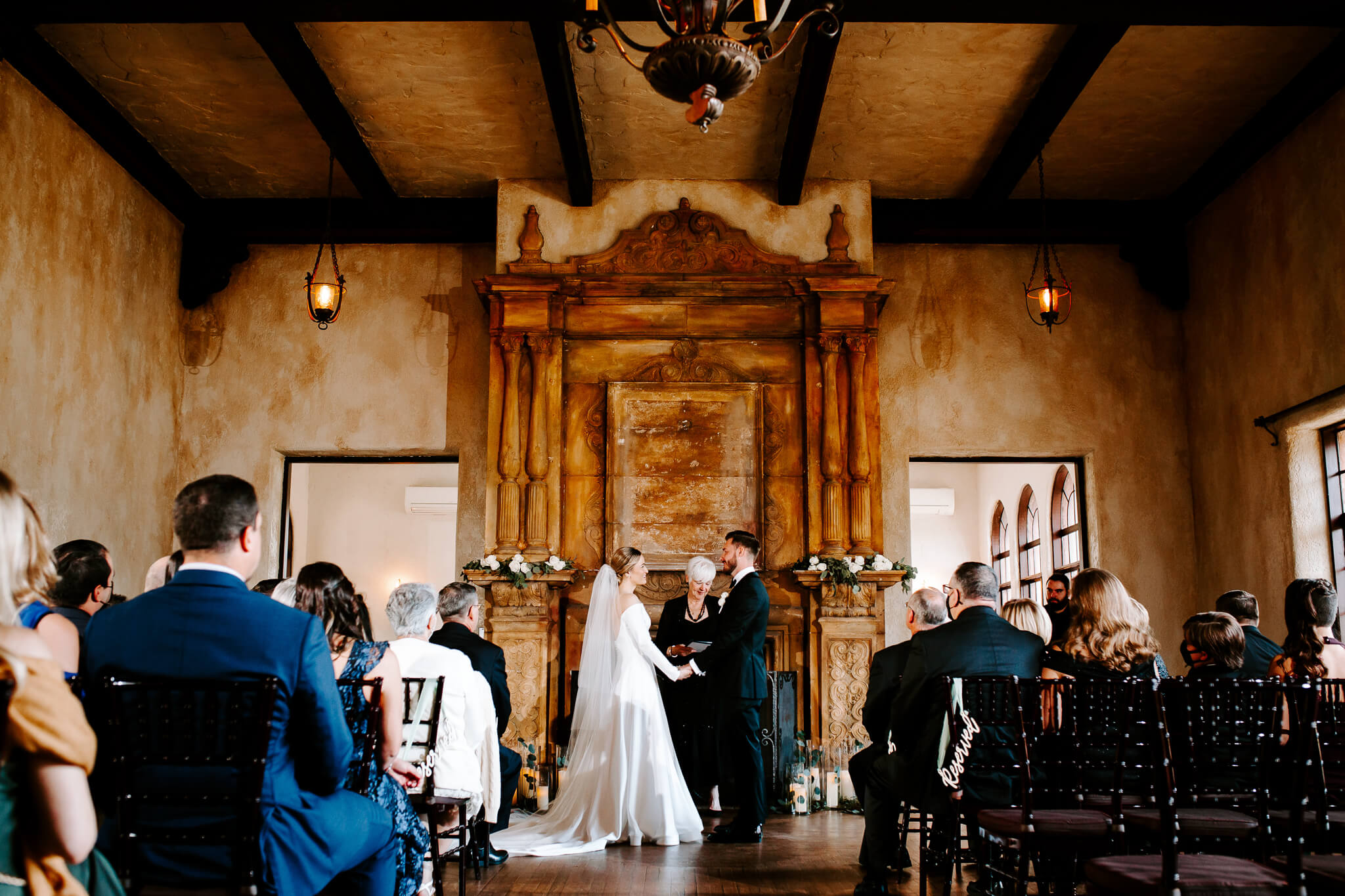wedding ceremony inside the howey mansion