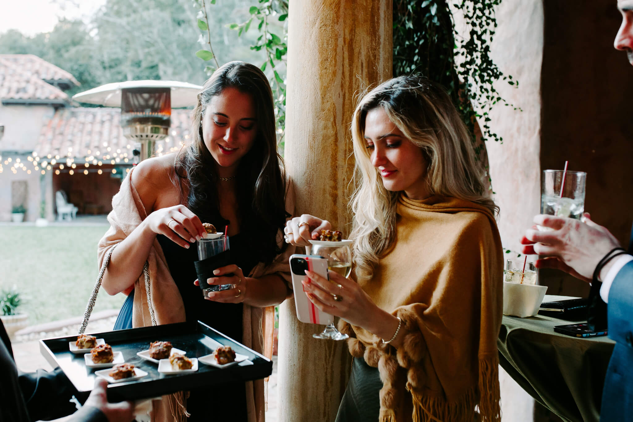 guests at a wedding enjoying snacks