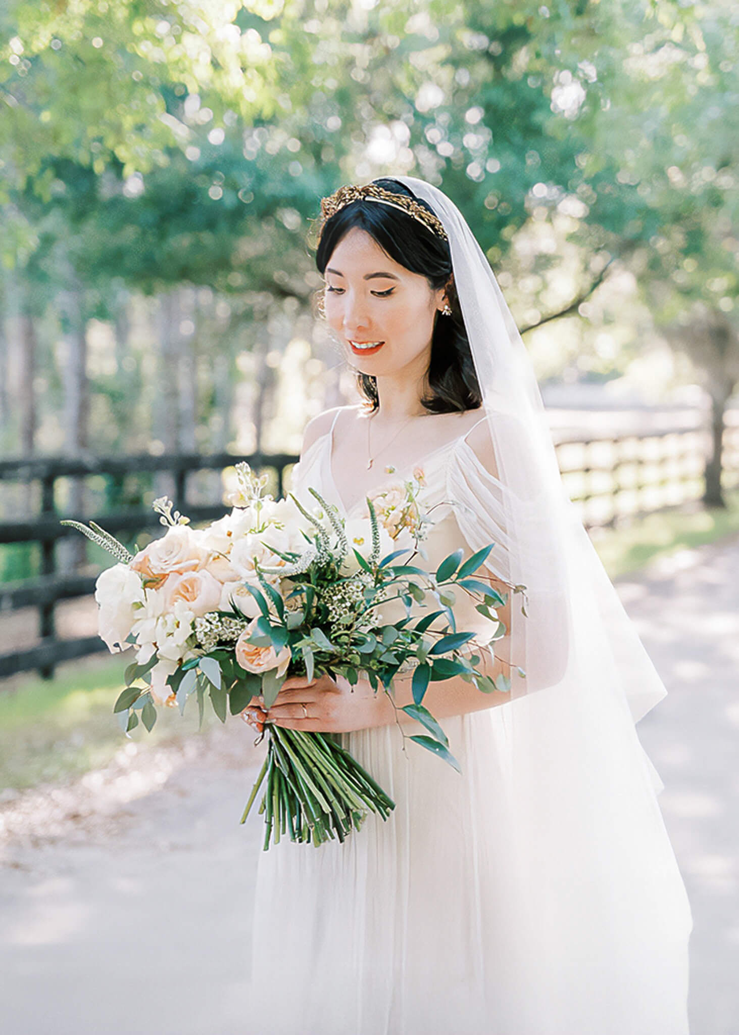 Bride poses for portrait at Club Lake Venue