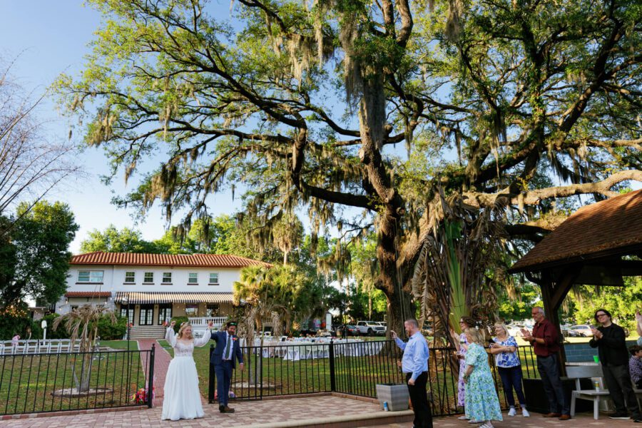 bride and groom celebrating with guests at Lake Lucy Estate