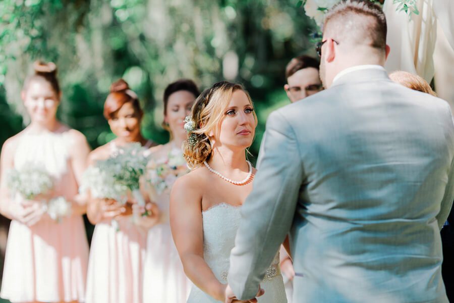 bride and groom during wedding ceremony at Leu Gardens wedding venue in Orlando