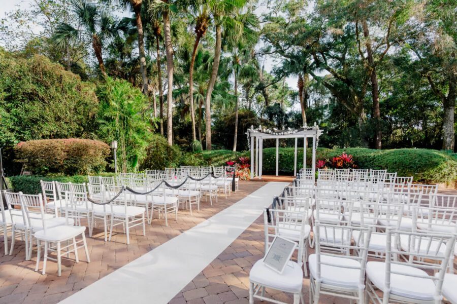 outdoor ceremony with with courtyard in nature at an affordable wedding venue in Orlando